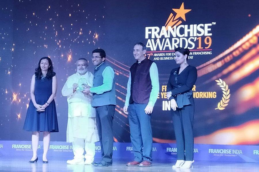 Brahmachari Girish Ji presenting awards at FRANCISE INDIA 2019 award ceremony to winners in different categogries, New Delhi