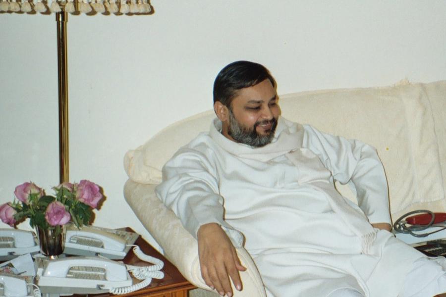Brahmachari Girish Ji enjoying a conference call with Maharishi Ji in his home at MERU Campus, Holland. Dec. 2002