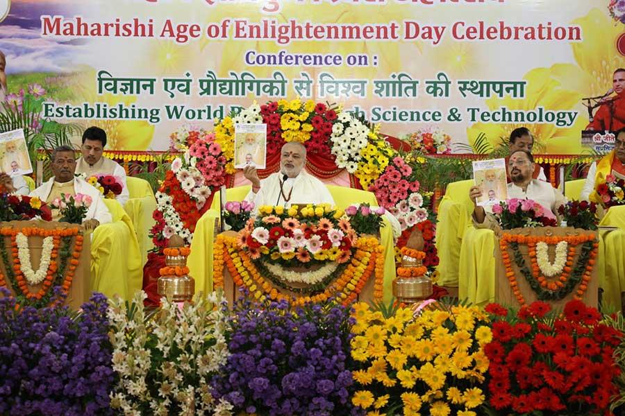 Brahmachari Girish Ji and other dignitaries releasing Maharishi World Peace Movement quarterly newsletter.